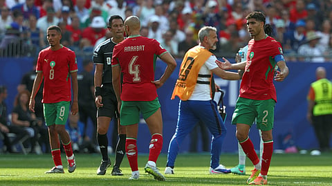 Morocco's defender #02 Achraf Hakimi (R) reacts after losing the 2026 World Cup football tournament quarter-final match between France and Morocco at Boston Stadium in Foxborough on July 9, 2026. 