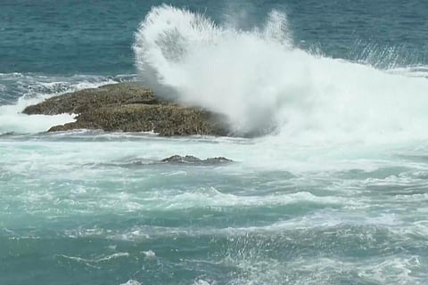 In this image made from video, waves crash on rocks ahead of Typhoon Bavi along the coast of Keelung in northern Taiwan on Thursday, July 9, 2026