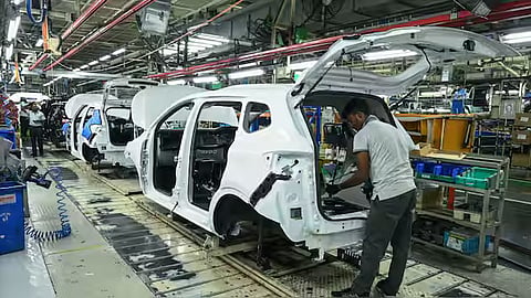An employee works in a car assembly line at the joint manufacturing facility of Renault Nissan Automotive India in Oragadam, Chennai. Owing to GST rate cuts, the sector reported robust sales