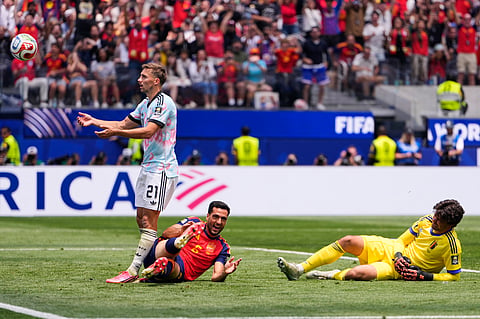 Spain's Mikel Merino (C) celebrates after scoring against Belgium