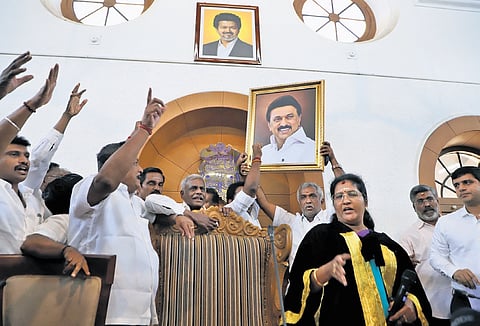 DMK councillors staging protest with the photo of ex-CM MK Stalin in Coimbatore 