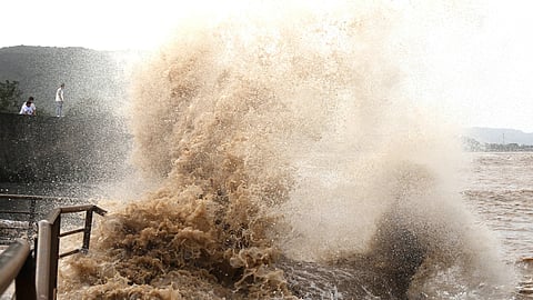 Huge waves crash on the coastline ahead of Typhoon Bavi in Wenling in eastern China's Zhejiang province, Friday, July 10, 2026. 