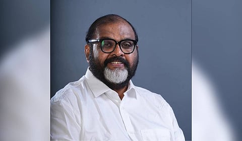 Transport Minister C P John.