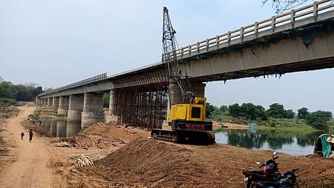 Construction of a bridge in Odisha's Mayurbhanj district, used for representation.
