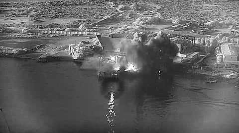 One-way attack-surface drones deployed by the US strike a submarine and ship maintenance facility in the port at Bandar Abbas, Iran.
