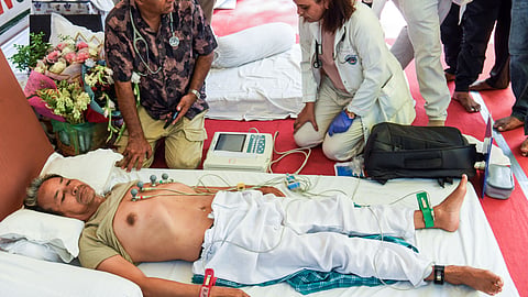 Medical staff check on activist Sonam Wangchuk on the 18th day of his indefinite hunger strike as part of the Cockroach Janata Party's (CJP) protest at Jantar Mantar in New Delhi on Wednesday, July 15, 2026.