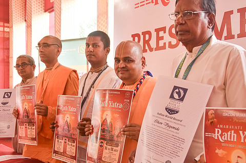 Management of ISKCON releases the flyer of upcoming Ratha Yatra during the press conference in Vijayawada on Tuesday. 