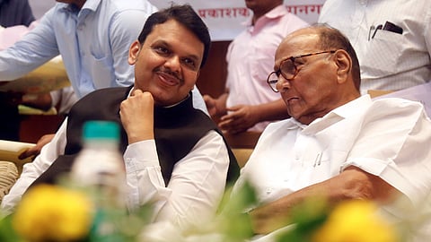 Maharashtra Chief Minister Devendra Fadnavis (L) with NCP (SP) chief Sharad Pawar.