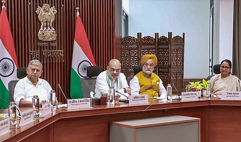Union minister Amit Shah, CM Rekha Gupta and L-G Taranjit Singh Sandhu during the meeting