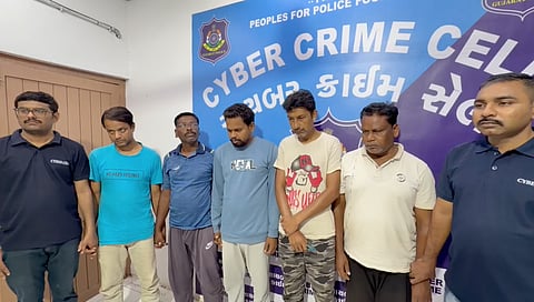 Surat Cyber Crime Cell with the arrested accused.