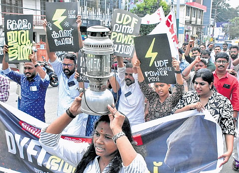 Carrying a lantern, DYFI activists march to the KSEB headquarters at Pattom in Thiruvananthapuram on Friday in protest against power cuts 