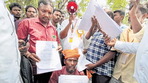 Hundreds of contract workers staged a demonstration in front of TNEB HQ in Chennai on Friday.