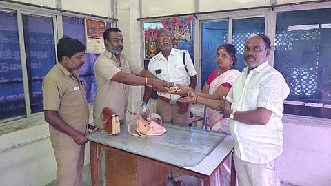 Coimbatore bus conductor Karunanidhi on Friday handed over a handbag to the parents who had lost it on the bus.