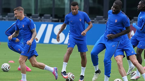 France's Kylian Mbappe, center, participates in a training session with the team ahead of their Bronze medal World Cup soccer match against England Friday, July 17, 2026, in Fort Lauderdale, Fla. 