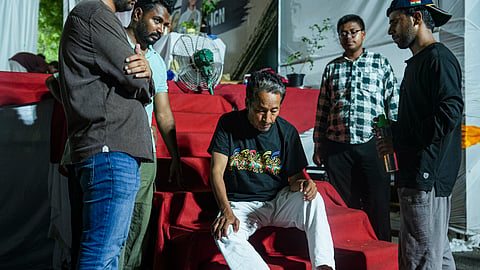 Educator and climate activist Sonam Wangchuk being assisted by supporters during a protest organised by Cockroach Janata Party (CJP) demanding Union Education Minister Dharmendra Pradhan's resignation over alleged irregularities in the NEET examination, at the Jantar Mantar, in New Delhi, late Friday, July 17, 2026. 