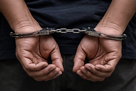 The two party functionaries allegedly used the name of Prohibition and Excise Minister K Vignesh and promised to secure the transporter a Tasmac loading contract.