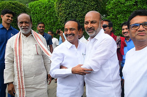 Union Minister of State for Home Bandi Sanjay Kumar and Malkajgiri MP Etala Rajender.