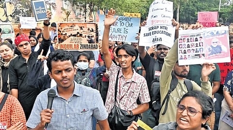 Youth protest at Bengaluru’s Freedom Park demanding that Union Education Minister Dharmendra Pradhan resign over the NEET paper leak issue, on Monday 