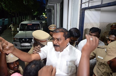 DMK MLA G. V. Markandayan arrives at the Government Medical College Hospital in Thoothukudi under police escort after being arrested . 