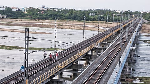 Youngsters taking selfies and social media reels on a railway track across the Cauvery river near Odathurai in Tiruchy.