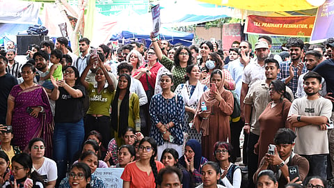 Cockroach Janata Party (CJP) supporters during a protest demanding Union Education Minister Dharmendra Pradhans resignation over alleged irregularities in the NEET examination, at the Jantar Mantar, in New Delhi, Sunday, July 19, 2026. 
