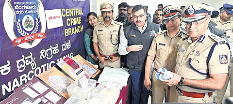 Police Commissioner Seemanth Kumar Singh with seized drugs 