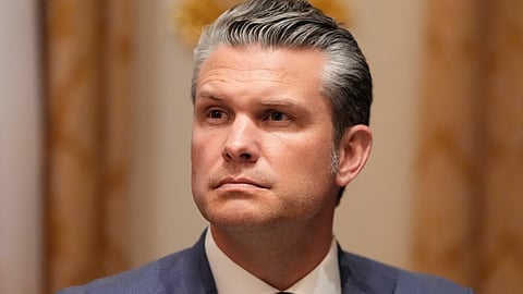 Defense Secretary Pete Hegseth listens as President Donald Trump speaks before a lunch with Ukraine’s President Volodymyr Zelenskyy in the Cabinet Room of the White House, Friday, Oct. 17, 2025, in Washington. 