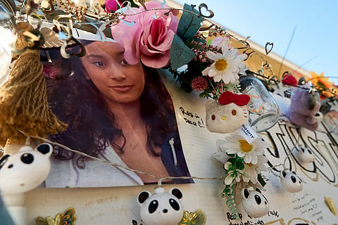 A makeshift memorial for Celeste Rivas Hernandez, whose body was found inside a vehicle owned by singer D4vd, is displayed outside her home in Lake Elsinore, Calif., on April 21, 2026.