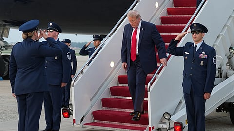 President Donald Trump exits Air Force One at Joint Base Andrews, Md., after attending the World Cup final soccer match, Sunday, July 19, 2026. 
