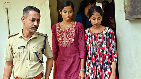 Akhila and Athulya, daughters of deceased Sudhakaran, outside the courtroom after Chenthamara’s sentencing in Palakkad on Monday.