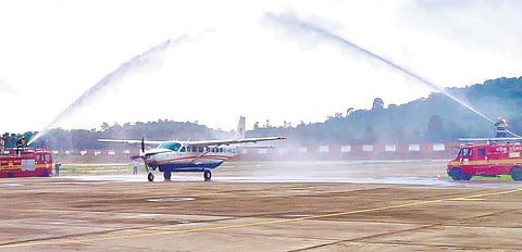 The passenger aircraft receiving a ceremonial water cannon salute 