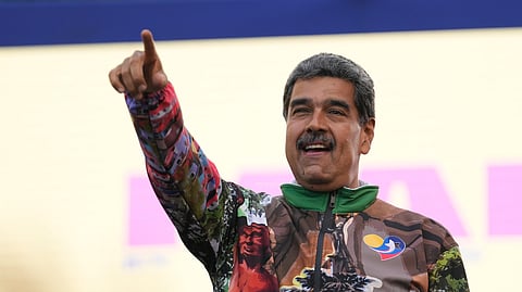 Venezuelan President Nicolas Maduro points to supporters during a campaign rally in the Catia neighborhood of Caracas, Venezuela, July 18, 2024.