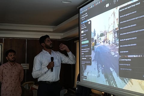 A BECC official presents the findings of the AI road survey on Wednesday.