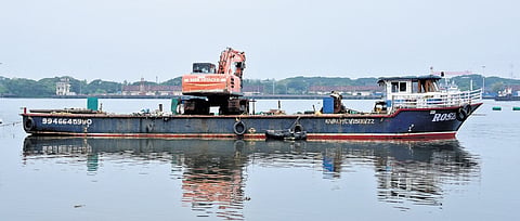 A dredger deployed to remove silt from the navigation channel anchored at Mattancherry terminal