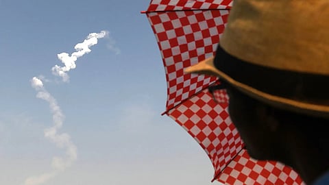 An onlooker watches as Isro's GSAT-6A communications satellite launches on the GSLV-F08 from Sriharikota, Andhra Pradesh in March, 2018