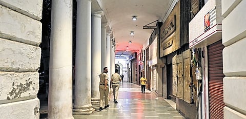 Connaught Place market wears a deserted look as it is closed during the ongoing agitation over the alleged NEET-UG examination irregularities, in New Delhi, Thursday, July 23, 2026. Shops, offices and restaurants in Connaught Place were closed from 6.30 pm on Thursday following an advisory issued by the New Delhi Traders Association (NDTA), citing the prevailing situation in and around the area. 