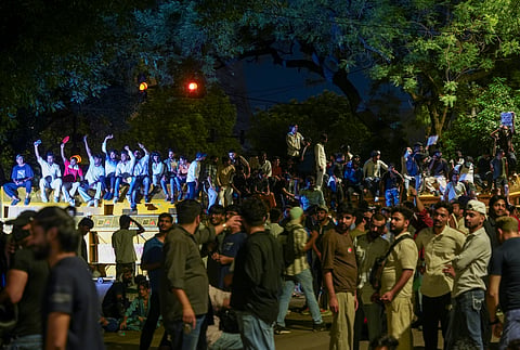 Cockroach Janata Party (CJP) supporters raise slogans during a protest at the Jantar Mantar, in New Delhi, early Thursday, July 23, 2026. 