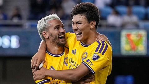 Antoine Griezmann celebrates with Justin Ellis after scoring on his MLS debut as Orlando City beat the San Jose Earthquakes 4-0 on Wednesday, July 23, 2026.