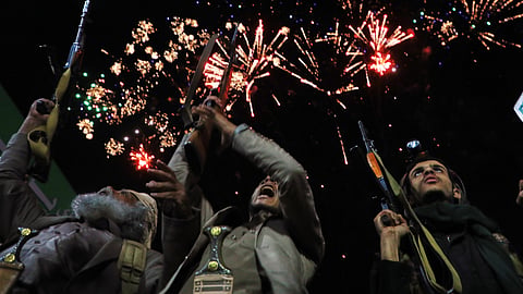Fireworks burst as Houthi supporters rally against the Saudi-led coalition in Sanaa, Yemen, Monday, July 20, 2026.