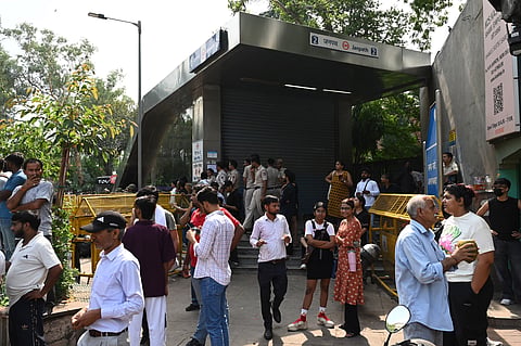 A view of the closed gates of janpath Metro station, in New Delhi on Thursday.