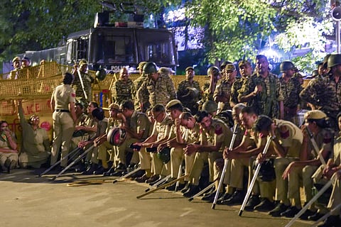 Police and security personnel stand guard during the CJP protest at Jantar Mantar on late Thursday evening 