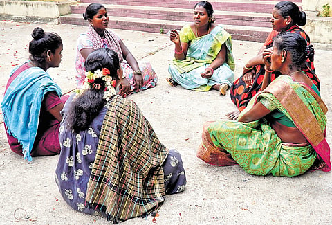 Sumathi with members of her self-help group at Melkalavai village. The savings scheme floated by the group has a monthly average savings of not less than Rs 1 lakh