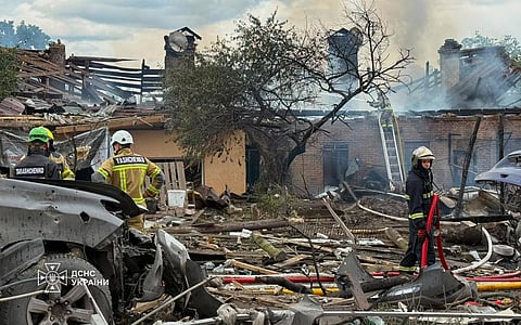 This photo provided by the Ukrainian Emergency Service, shows the site of Russian missile strikes in Kyiv region, Ukraine, Friday, July 24, 2026. 