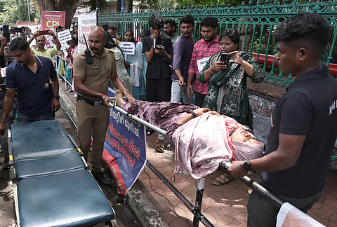 Surumi, a member of the Kerala LP School Teacher PSC Rank Holders Association, being shifted to a hospital after her health deteriorated during a recent hunger strike in front of the Secretariat.