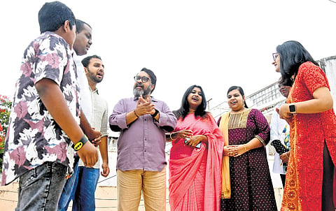 Vinodh Venugopal and Reshmi teaching vocals to the autistic children at Samagradha Foundation in Kotturpuram, Chennai.