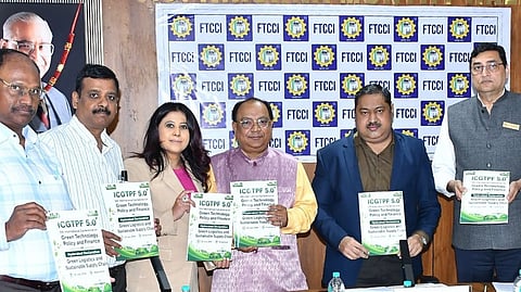 Additional collector Kadhiravan Palani, along with FTCCI president (Hyderabad) KK Maheshwari, release the Hyderabad Declaration on Saturday.