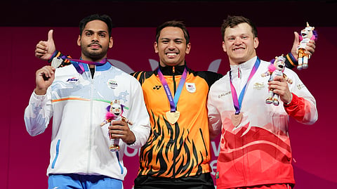 Ajaya Babu (L) during the medal ceremony of the men's 79kg weightlifting event on Monday 