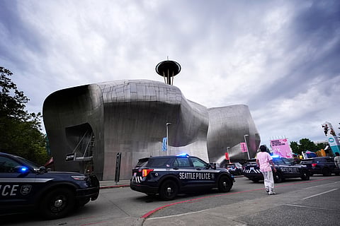 Police respond to a shooting at Seattle Center during the Bite of Seattle food festival Sunday, July 26, 2026, in Seattle.
