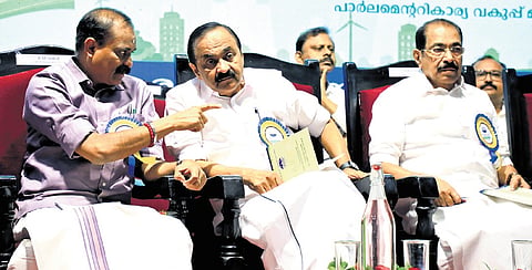 Chief Minister V D Satheesan interacts with Mayor V V Rajesh at the statewide inauguration of workshops on solid waste management on Monday. Electricity Minister Sunny Joseph is also seen