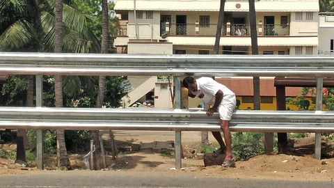 Residents face difficulties accessing the Tiruchy-Karur highway after the century-old public pathway in Murungapettai near Tiruchy. 